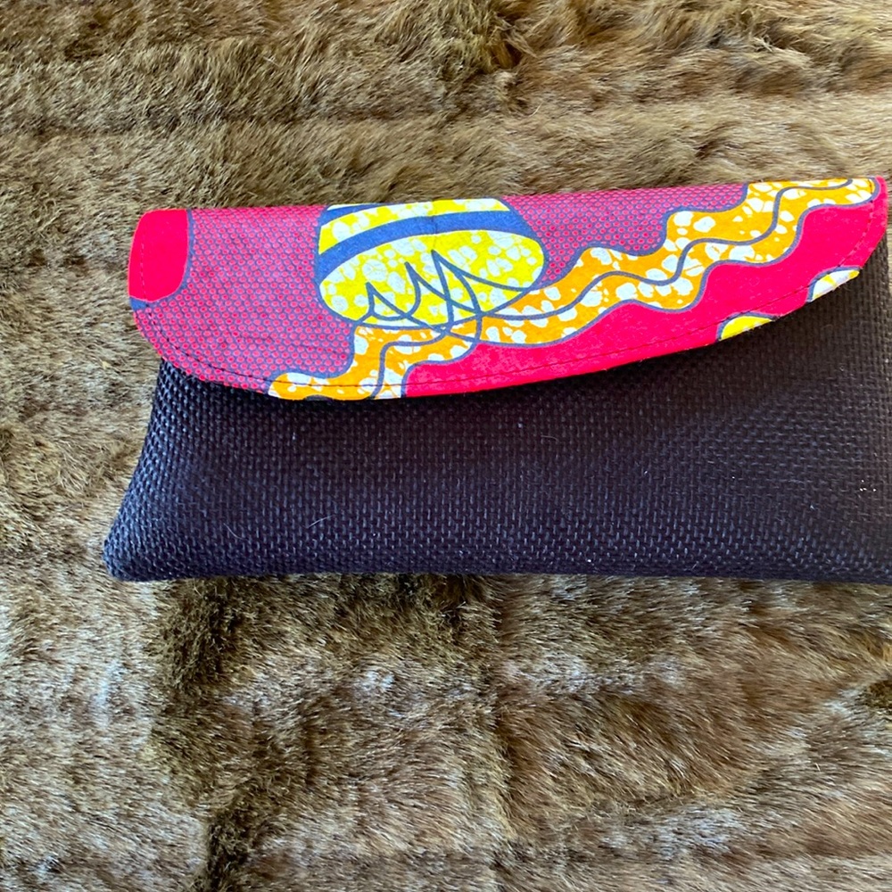 Abstract print clutch bag.